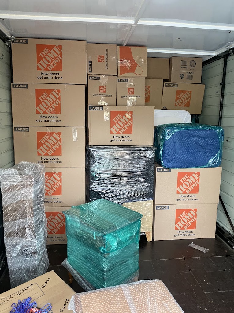 Fully loaded moving truck with boxes and padded furniture, Columbus move