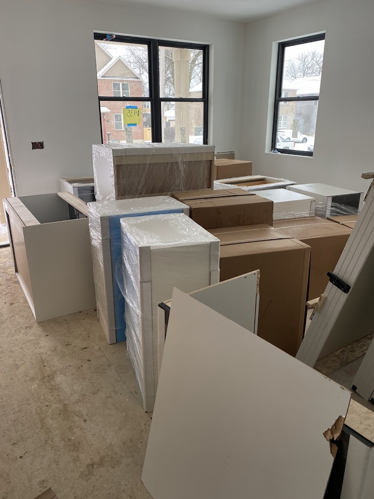 Wrapped cabinets and furniture delivered and staged in a Columbus home