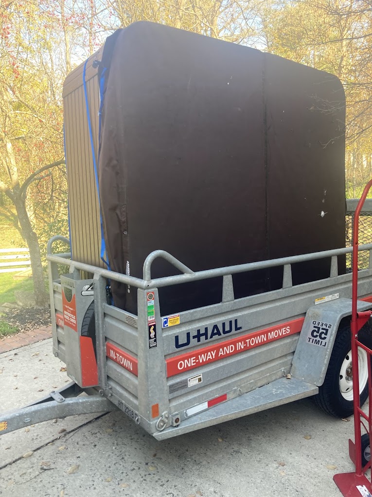 Hot tub secured on a trailer, specialty hot tub moving service Columbus